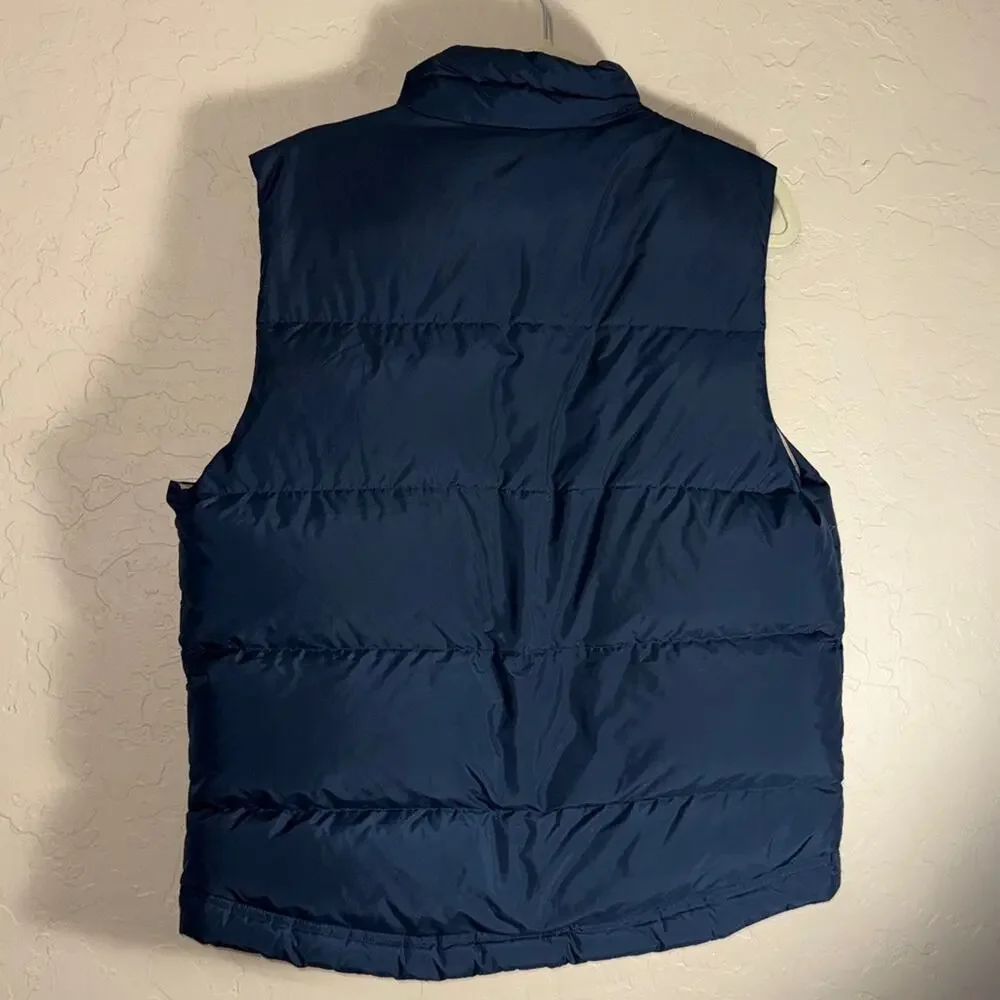 J. Crew men’s blue down filled puff vest size medium.